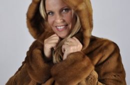 Blonde woman in a fur coat